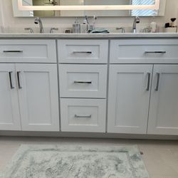 John Dolan Flooring, Kitchen and Bath - Custom special sized vanity with quartz counter.