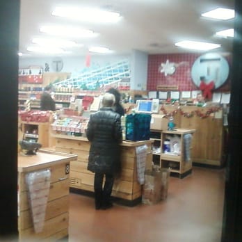 Trader Joe's - Checkout counter and customer service through front window glass, Dec 22, 2014. - Grocery Near Me - Cambridge, Massachusetts