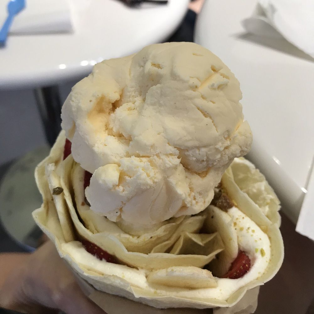 Pearls N Swirls - a hand holding a cone of ice cream - Ice Cream & Frozen Yogurt Near Me - Fairfield, Connecticut Pearls N Swirls - a hand holding a cone of ice cream - Ice Cream & Frozen Yogurt Near Me - Fairfield, Connecticut