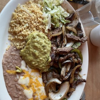 El Cid Mexican Cuisine - Sideways steak fajitas. If you turn your head clockwise 90 degrees, it'll make more sense! - Mexican Near Me - Oakhurst, California El Cid Mexican Cuisine - Sideways steak fajitas. If you turn your head clockwise 90 degrees, it'll make more sense! - Mexican Near Me - Oakhurst, California