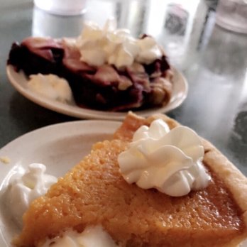 Aunny's - Sweet potato pie and berry pie in the background. - Southern Near Me - Georgetown, South Carolina Aunny's - Sweet potato pie and berry pie in the background. - Southern Near Me - Georgetown, South Carolina