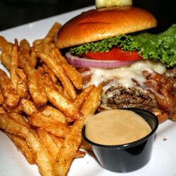 Black Rock Bar & Grill - Mushroom Swiss burger cooked to order. Crispy fries & rock sauce. To die for! Pair it with Victory Golden Monkey beer.