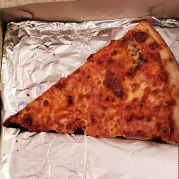 a slice of pizza in a box a slice of pizza in a box
