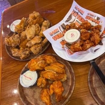 Hooters - From left to right, the left 20 piece of Chesapeake breaded (original), 6 boneless Honey Siraracha, and 10 breaded Buffalo Hot Honeys! - Sports Bars Near Me - Rohnert Park, California