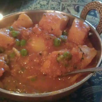 Royal India - Aloo mutter...peas and potatoes in a spicy tomato sauce - Indian Near Me - Bountiful, Utah Royal India - Aloo mutter...peas and potatoes in a spicy tomato sauce - Indian Near Me - Bountiful, Utah