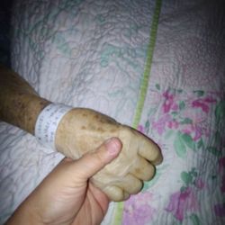 Hospice of Marion County - Holding my mother's hand after she had passed.
