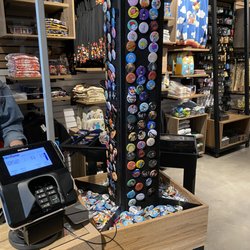 BoxLunch - Fun pin buttons placed at the register to tempt you into last-minute purchases.
