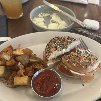 The Henry - Lox on a burnt bagel and side of overcooked home fries. - Coffee & Tea Near Me - Coronado, California