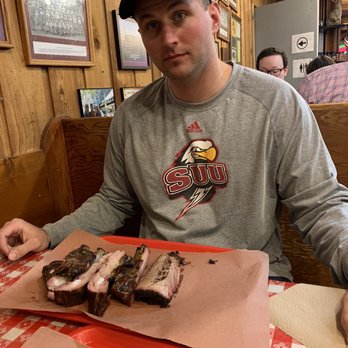 Black's Barbecue Lockhart - Utah ANG Pilot Luke (former Oregon State Defensive End) cleaning up the protein - Barbeque Near Me - Lockhart, Texas Black's Barbecue Lockhart - Utah ANG Pilot Luke (former Oregon State Defensive End) cleaning up the protein - Barbeque Near Me - Lockhart, Texas