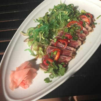 Zelo - Beef Tataki appetizer with Wakame Salad. Don't let the seaweed salad fool you - looks weird, tastes phenomenal!! - Italian Near Me - Minneapolis, Minnesota