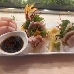 From L to R: hamachi, toro, wahoo, snapper (behind wahoo)