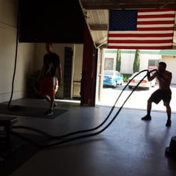 Travis going at it with the infamous battle ropes Travis going at it with the infamous battle ropes