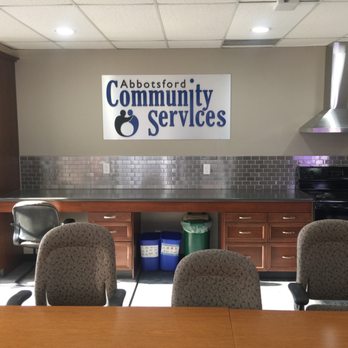 Perrin Interior Renovations - Archway Community Services Boardroom. Cabinetry, countertops, tile, range hood and plumbing. - General Contractors Near Me