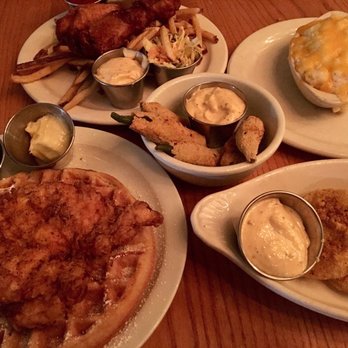 The Rarebit - chicken and waffles, fish and chips, fried okra, fried green tomatoes, and cheese grits - New American Near Me - Charleston, South Carolina The Rarebit - chicken and waffles, fish and chips, fried okra, fried green tomatoes, and cheese grits - New American Near Me - Charleston, South Carolina