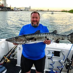 Hookem & Cookem Charters - Client catches huge baracuda!