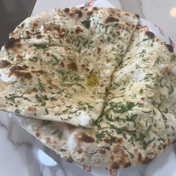 Naan & Curry - Garlic naan. 5/5 -- the best when it's fresh out of the tandoor! - Indian Near Me - Henderson, Nevada Naan & Curry - Garlic naan. 5/5 -- the best when it's fresh out of the tandoor! - Indian Near Me - Henderson, Nevada