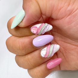 Nail extensions on gel manicure with marshmallow inspired nail design