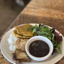 Chicken, rice, beans. Plantains and salad