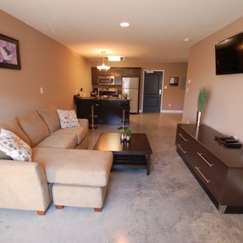The Hotel Sync - Living room and kitchen view.  The Hotel Sync has ZERO carpeting! - Hotels Near Me - Bowling Green, Kentucky