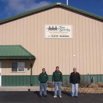 AAA Tree Service - two men standing in front of a building - Tree Services Near Me - Franklin, Wisconsin