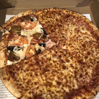 Town Center Pizza - What we had left from two pies- plain and super veggie. Delicious! - Pizza Near Me - Northborough, Massachusetts Town Center Pizza - What we had left from two pies- plain and super veggie. Delicious! - Pizza Near Me - Northborough, Massachusetts