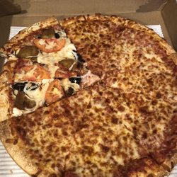 Town Center Pizza - What we had left from two pies- plain and super veggie. Delicious!