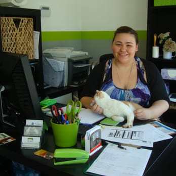 Pawsitive Veterinary - One of our receptionists giving Dublin (our clinic cat) some attention. - Pet Services Near Me - Brooklyn, New York Pawsitive Veterinary - One of our receptionists giving Dublin (our clinic cat) some attention. - Pet Services Near Me - Brooklyn, New York