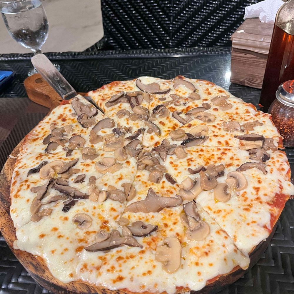 Two Seasons Resorts - Mushroom pizza - Hotels Near Me - Malay, AKL