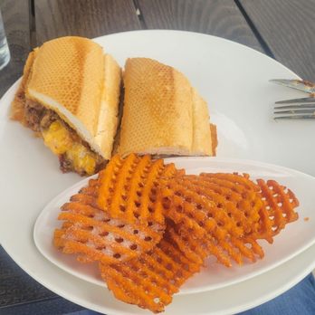Salt Smokehouse - Bulgogi Cheesesteak and sweet potato waffle fries - Barbeque Near Me - Huntsville, Alabama Salt Smokehouse - Bulgogi Cheesesteak and sweet potato waffle fries - Barbeque Near Me - Huntsville, Alabama
