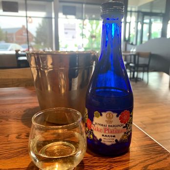 Sushi Thai @ the Park - a blue bottle and a glass of wine - Japanese Near Me - Clifton Park, New York Sushi Thai @ the Park - a blue bottle and a glass of wine - Japanese Near Me - Clifton Park, New York