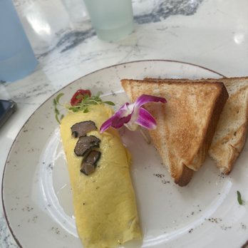 Sunny Side Cafe & Eatery - Truffle omelette - Breakfast & Brunch Near Me - Miami Beach, Florida Sunny Side Cafe & Eatery - Truffle omelette - Breakfast & Brunch Near Me - Miami Beach, Florida