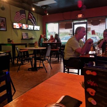 Coco's Cuban Restaurant - Traditional American-Cuban Cafe style abounds in the dining room. - Cuban Near Me - Cumming, Georgia