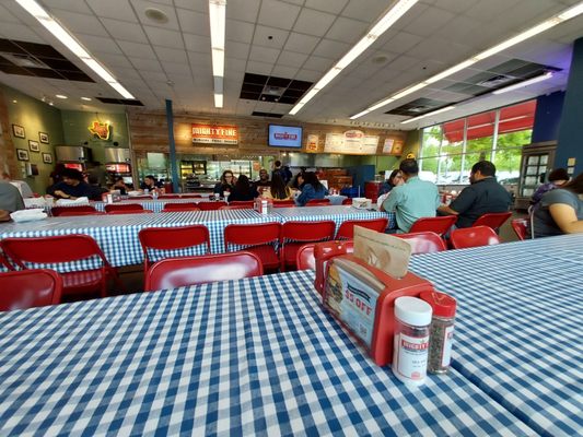 Photo of Mighty Fine Burgers - Austin, TX, US. Interior seating