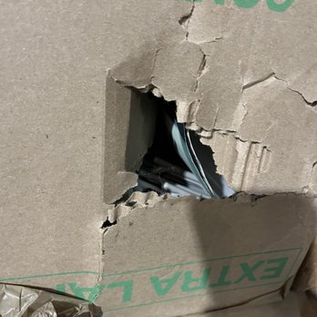Extra Space Storage - Rat chewing through more boxes - Self Storage Near Me - Cicero, Illinois