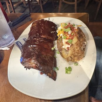 Outback Steakhouse - Baby Back Ribs Dressed Baked Potato - Steakhouses Near Me - Northridge, California Outback Steakhouse - Baby Back Ribs Dressed Baked Potato - Steakhouses Near Me - Northridge, California