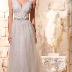 Mignon Manley Bridal and Fashions - JOVANI BRIDAL