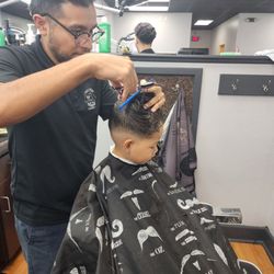 Neat Fades Barbershop - Eddie working his magic with the kiddos