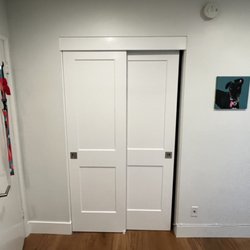Handyman Painting Orange County - Installing hardware and doors back to the closet!