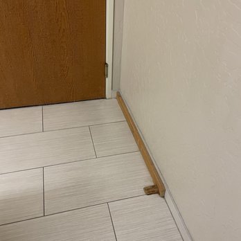 Holiday Inn The Lodge at Big Bear Lake - Not even sure why this random piece of wood was mailed to the wall - Big Bear, CA
