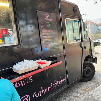 Tamashii - a woman ordering food from a food truck - Food Trucks Near Me