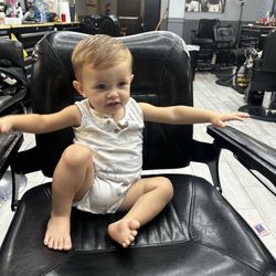 Fresh Cutz Barbershop - Lane in the barber chair 1st time