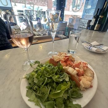 Neptune Oyster - Maine Lobster Roll Sandwich with Arugula salad - Seafood Near Me - Boston, Massachusetts