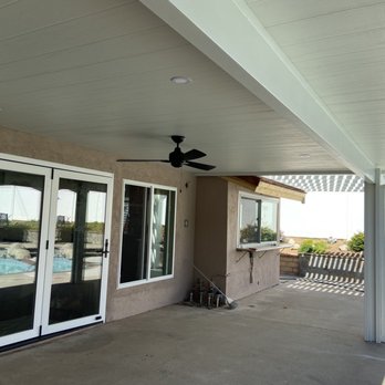 C.G. Patio Rooms and Covers - Cover along the outside of the main living area. Includes fan and 4 recessed lights. - Patio Coverings Near Me C.G. Patio Rooms and Covers - Cover along the outside of the main living area. Includes fan and 4 recessed lights. - Patio Coverings Near Me