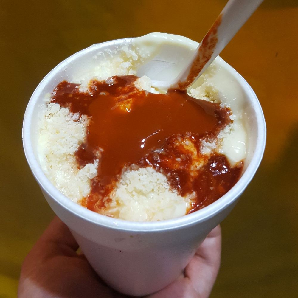 Elotes Fanny - Squeezed some lime and added some Regular and No Picosa sauces on top - Mexican Near Me - carrolton, Texas