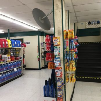 Renys Department Store - One of the stairways and the elevator on the left - Department Stores Near Me - Dexter, Maine