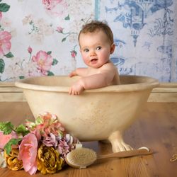 We LOVE babies and have hundreds of props, clothing and background options