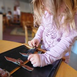 Desert Montessori Academy - Working on those buckling skills.