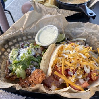 Torchy's Tacos - Mr. Orange salmon in corn tortilla and the Republican in flour tortilla. - Tex-Mex Near Me - Raleigh, North Carolina Torchy's Tacos - Mr. Orange salmon in corn tortilla and the Republican in flour tortilla. - Tex-Mex Near Me - Raleigh, North Carolina