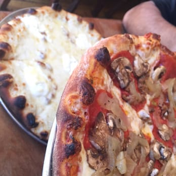 LouEddie's Pizza - An all meat pizza and the white out in the background. Both solid choices! - Pizza Near Me - Skyforest, California