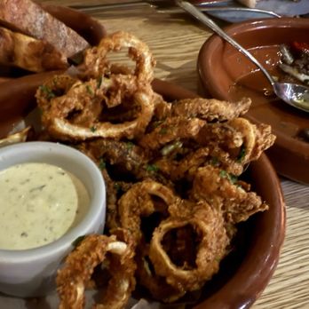 Debajo - Calamari. I like this kind of messy batter. The batter had seasoning as well. Very crispy! - Tapas Bars Near Me - New York, New York